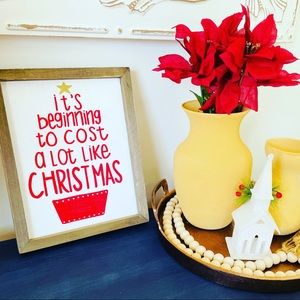 Cost A Lot Like Christmas Sign